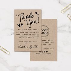 two wedding thank you cards on a marble surface