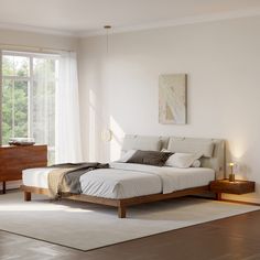 a bedroom with a bed, nightstands and large window in it's corner