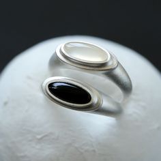 Product Details Material: silver-plated/925 silver/black agate/white chalcedony Size: The height of the ring surface is about 7mm Weight: about 5g Strongly Recommend Pairing Both Colors: For a truly versatile and stylish wardrobe, we strongly recommend considering both color options – black and white – and wearing them together. The black and white combination offers a classic and timeless look that complements a wide range of outfits and occasions. By having both colors in your collection, you Black Agate Ring, Woven Ring, Stylish Wardrobe, Chalcedony Ring, Chanel Earrings, White Jade, Agate Ring, Black Agate, 925 Silver Jewelry