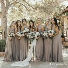 a group of women standing next to each other