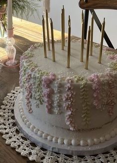 a decorated cake sitting on top of a table