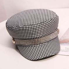 Women can add a sense of appeal to their overall fashionable look with this plaid patterned winter visor cap. This fat top short eave designed hat suits for leisure and casual occasions. This ultra-fashionable cap is made of comfortable cotton and will let you stand out in the crowd with its exclusive rhinestone design.SpecificationsBrand Name: GeraldBlackGender: WomenDepartment Name: AdultMaterial: COTTONPattern Type: PlaidStyle: CasualModel Number: H294Item Type: VisorsSize: 56-58cmStyle: Leis Plaid Cap For Fall, Trendy Winter Flat Cap Baseball Cap, Casual Plaid Hat For Fall, Winter Plaid Hat With Short Brim, Plaid Short Brim Winter Hat, Plaid Short Brim Hat For Winter, Plaid Short Brim Fall Hats, Plaid Short Brim Hat For Fall, Trendy Fitted Flat Cap