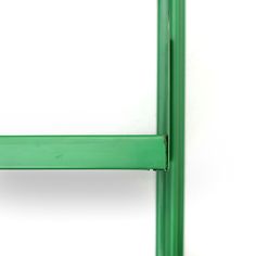 a close up view of a green door handle