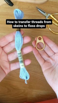 two hands holding yarn and scissors with the words how to transfer threads from skeins to floss drops