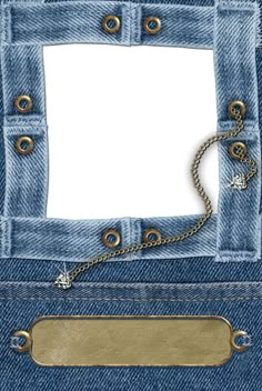 the back pocket of a pair of blue jeans with a gold chain hanging from it