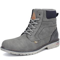 a pair of grey boots with laces on the side