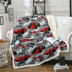 a red race car on a gray background blanket