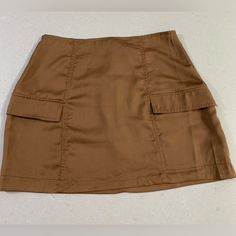 Kendall & Kylie Satin Cargo Mini Skirt. Size Small L. Brand New With Tags. Super Soft And Lightweight. Trendy And Fun! Smoke Free/Pet Free Home. Brown Lined Mini Skort, Brown Mini Skort With Pockets, High Waist Brown Skort With Pockets, Fitted Brown Skort With Pockets, Brown Mini Skirt With Pockets, Fitted Mini Cargo Skirt With Lining, Brown Mini Skort, Fitted Lined Mini Cargo Skirt, Brown Pencil Skirt With Pockets