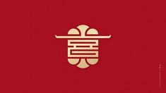 the chinese word is written in gold on a red background