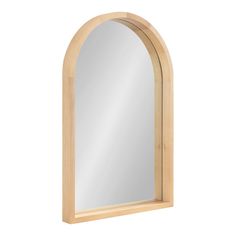 an arched wooden mirror on a white background