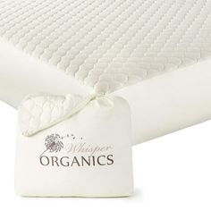 the organics mattress pad is folded up and ready to be used