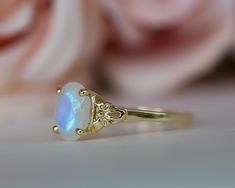 This is an oval moonstone ring, vintage style moonstone engagement ring, solitaire ring, moonstone engagement ring, gemstone ring, moonstone gold ring, oval engagement ring, a perfect moonstone engagement ring. This vintage style floral ring and has a dainty and feminine design, a solitaire vintage style with a natural oval rainbow moonstone, that symbolizes passion and endless love. This unique engagement ring is the best way to show your pure love for the one you love. ♥ Moonstone Gemstone mea Engagement Ring Moonstone, Engagement Ring Gemstone, Gold Moonstone Ring, Antique Style Rings, Ring Moonstone, Moonstone Engagement, Gemstone Meanings, Oval Engagement, Engagement Ring Vintage