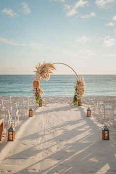 an outdoor wedding setup on the beach