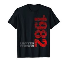 a black t - shirt with the words born in red and white letters on it