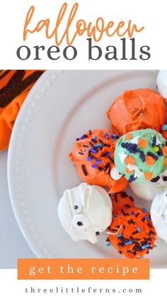 halloween oreo balls on a plate with sprinkles