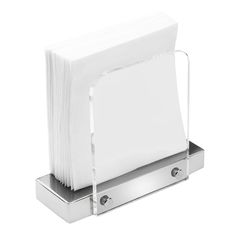 a stack of white napkins sitting on top of a metal holder in front of a white background