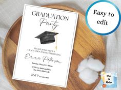 a graduation party flyer with cotton on a wooden plate