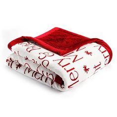 two red and white blankets with the words merry christmas written on them, one is folded in