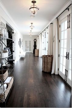 an image of a room with wood floors