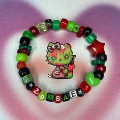 Scenecore Zombie "zombae" Kandi Bracelet - Handmade... - Depop Kandi Perler Beads, Scenecore Bracelets, Emo Kandi Ideas, Scene Kandi Ideas, Scene Kid Bracelets, Zombie Kandi