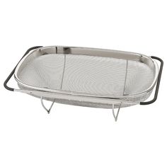 a large stainless steel mesh strainer on a white background