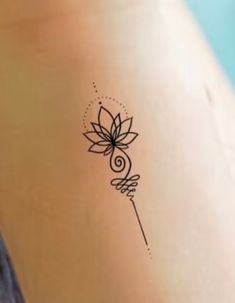 a tattoo on the back of a woman's arm