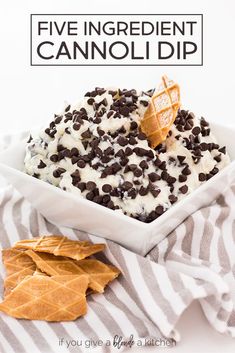 a white bowl filled with ice cream and chocolate chips