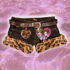 Gyaru grunge mcbling black fur trim shorts with NANA heart design and heart keychain. Super cute and versatile.  *Reworked to order. Takes 2 weeks to ship *Does not include belt ❗Shorts will vary slightly in color. Each item is unique. Can be made in sizes XS-XL (message me your measurements after placing order) About 10.5 in length (can be made shorter or longer) Mcbling Shorts Outfit, Mcbling Black, Gyaru Fashion 90s, Gyaru Tops, Grunge Mcbling, Hime Gyaru Fashion, Reworked Shorts, Gyaru Clothing, Gyaru Grunge