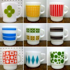 many different colored coffee mugs sitting on top of each other