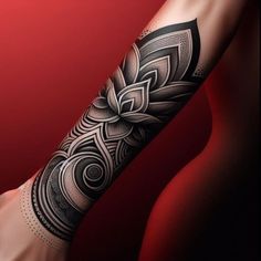 a woman's arm with an intricate tattoo design on it