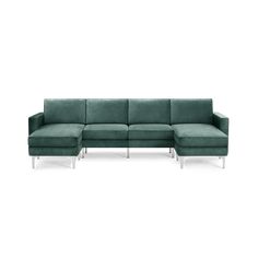 a green sectional sofa with wooden legs