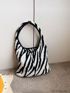 BagForLove - Stylish Zebra-Patterned Crochet Bag Product Description Color Black and White Pattern Type Zebra Stripe Bag Size Medium Type Crochet Bags Style Vacation Strap Type Top Handle Closure Type No-closure Composition 100% Polyester Material Polyester Size Chart INCH CM Bag Length Bag Width Bag Height Handle Height 13.4 inch 0.4 inch 11.4 inch 11.8 inch Bag Length Bag Width Bag Height Handle Height 34 cm 1 cm 29 cm 30 cm Details Pictures Similar Products h2 { text-align: center; } /* æ¢è¡ Knitwear Trends, Plus Size Sports Bras, Striped Bags, Zebra Pattern, Baguette Bag, Print Trends, Black Crochet, List Style, Hats For Sale