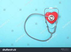 a heart shaped stethoscope on a blue background