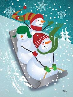 two snowmen on sled in the snow