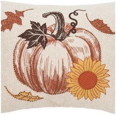 a decorative pillow with a pumpkin and sunflower on it