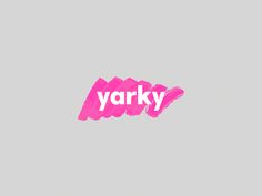 the word yarky painted in pink on a gray background