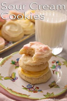 three cookies stacked on top of each other with the words sour cream cookies in front of them