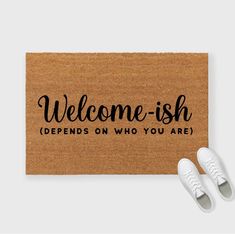 a welcome mat with the words'welcome - ish defends who you are '