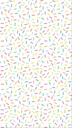 colorful sprinkles on white background