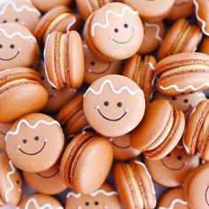 macaroons with faces drawn on them sitting in a pile