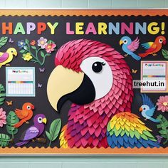 a bulletin board with a colorful parrot and birds on it that says happy learning, freehut in