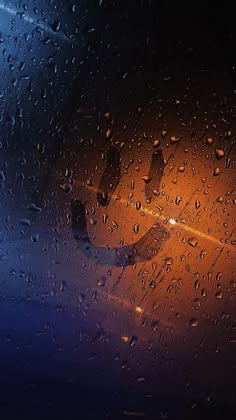 rain drops on the windshield of a car