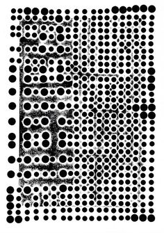 black and white circles are arranged in the shape of a rectangle, which is surrounded by smaller dots