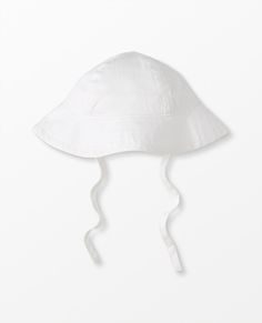 Sunblock Floppy Sun Hat - Size XXS - White - Mercerized cotton twill Blocks 97% of UVA/UVB rays Wide brim with topstitching Handy chin ties STANDARD 100 by OEKO-TEX® |  Prewashed Imported. Baby, Baby Accessories, Hats & Headbands. Floppy Sun Hat, Family Pjs, Floppy Sun Hats, Toddler Accessories, Best Pajamas, Toddler Hat, Matching Family Pajamas, Boy Accessories, Sun Rays