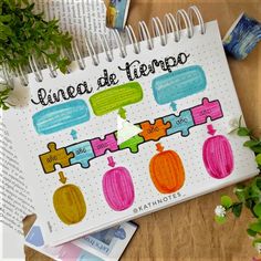 a spiral notebook with the words linea de tierpo written in spanish on it