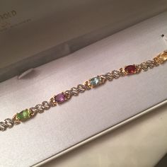 Sterling Silver Over 18k Gold. 7” Long With Semi Precious Stones. Brand New, Never Worn With Tags. Silver Tennis Bracelet, Semi Precious Stones, Tennis Bracelet, Womens Jewelry Bracelets, Semiprecious Stones, Precious Stones, Semi Precious, Silver Gold, 18k Gold