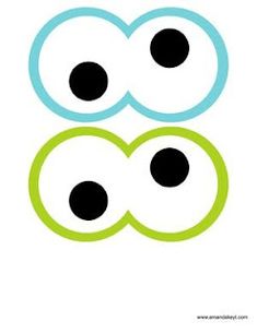 two circles with black dots on them and one green circle in the middle, all connected together