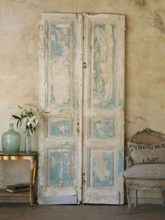 shabby cottage chic colors with an antique armoire and chair in the corner