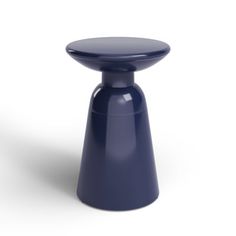 a blue stool sitting on top of a white floor