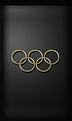 three gold rings on a black background with the olympic symbol in the middle and two smaller ones